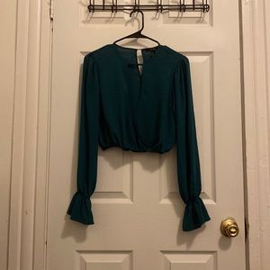 Green cropped v neck blouse